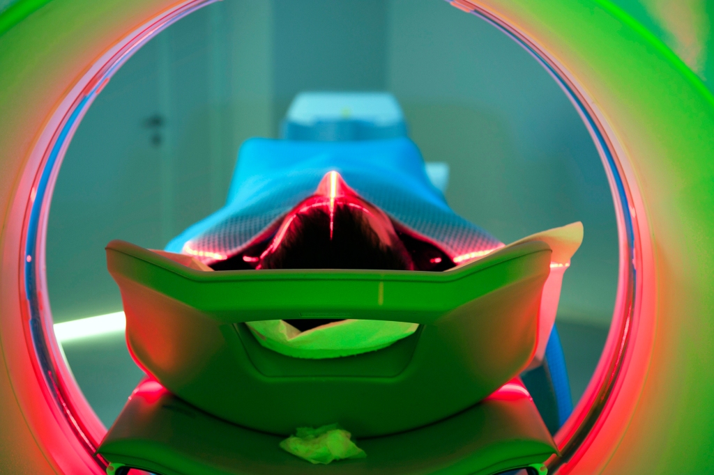 Patient lying on CT scan platform