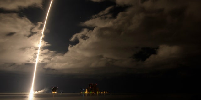 A United Launch Alliance Atlas V rocket with the Space Shuttle is seen in this 2 minute and 30 second exposure photo taken by Space Launch Complex 41 on Saturday, Oct. 16.  2021, at the Cape Canaveral Space Station in Florida. 