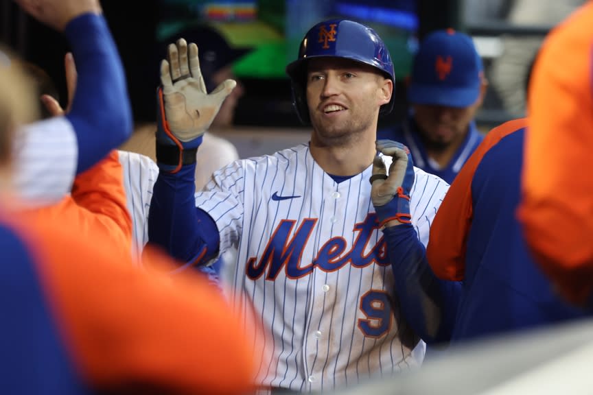 New York Mets center fielder Brandon Nimmo (9) celebrates his solo home run against the Washington Nationals with teammates in the dugout during the fourth inning at Citi Field.