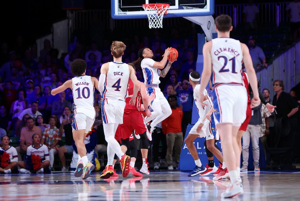 Kansas guard Bobby Pettiford Jr. hits the game-winning shot in the final second to beat Wisconsin in overtime on Thursday.
