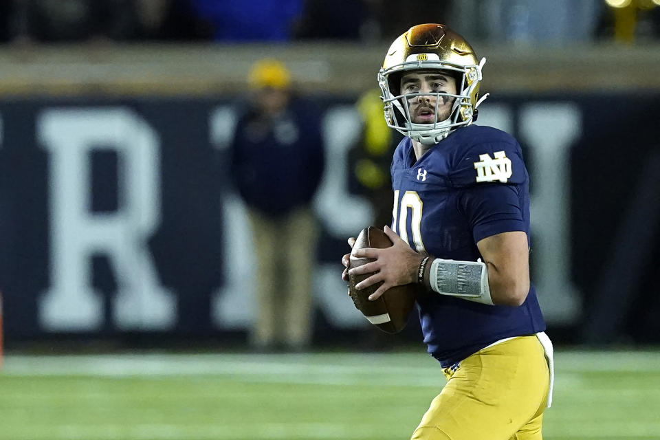 Notre Dame quarterback Drew Pyne took over as the team's starting quarterback early in the season after Tyler Buchner was injured.  (AP Photo/Charles Rex Arbogast)