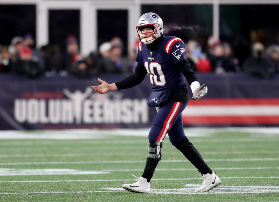 New England Patriots quarterback Mac Jones was fined for two separate incidents in last week's loss to the Cincinnati Bengals.  (Photo by John Tlumacki/The Boston Globe via Getty Images)