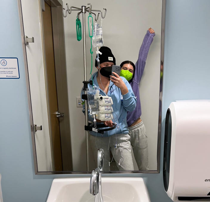 Jessie Sanders with her sister Kaitlyn Sanders in the bathroom while undergoing chemotherapy at Kaiser.  (Courtesy of Jessie Sanders)