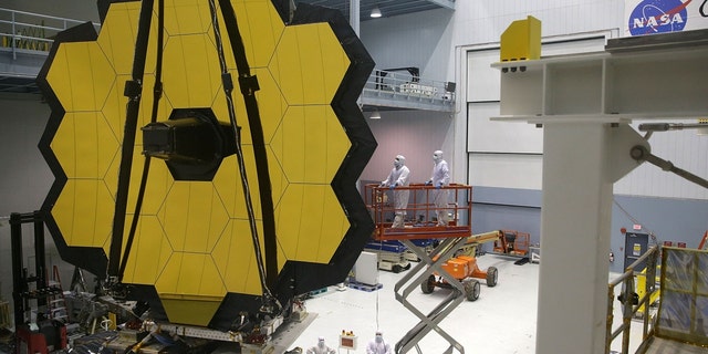 GREENBELT, MD - NOVEMBER 02: Engineers and technicians assemble the James Webb Space Telescope on November 2, 2016, at the NASA Goddard Space Flight Center in Greenbelt, Maryland. 