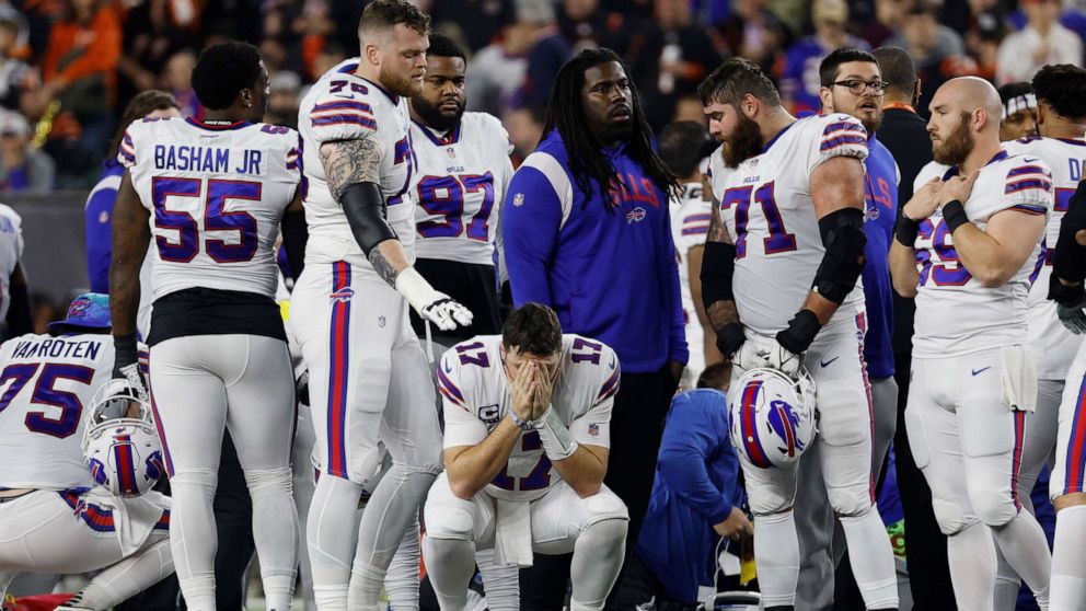 PHOTO: Buffalo Bills players react after teammate Damar Hamlin collapsed during an NFL game against the Cincinnati Bengals on Jan. 2, 2023, in Cincinnati.