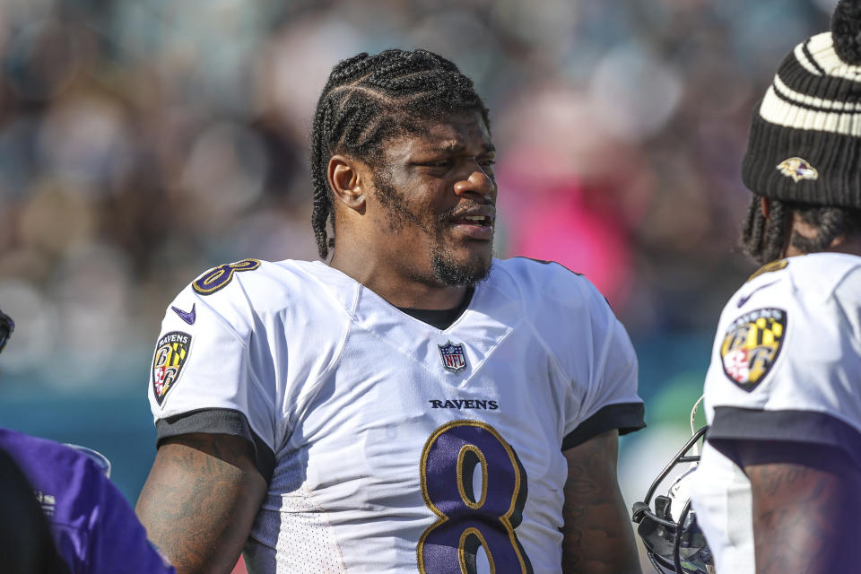 Baltimore Ravens QB Lamar Jackson has missed the last five games with a knee injury and could miss Sunday's playoff game against the Cincinnati Bengals.  (AP Photo/Gary McCullough)