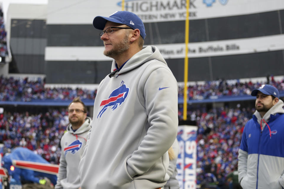 Bills assistant coach Denny Kellington takes the field before an NFL football game against the New England Patriots on Sunday, Jan. 8, 2023, in Orchard Park, NY (AP Photo/Joshua Bessex)