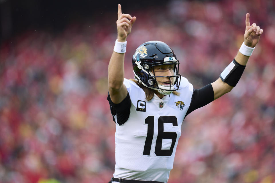 KANSAS CITY, MO - JANUARY 21: Trevor Lawrence #16 of the Jacksonville Jaguars celebrates after scoring a touchdown against the Kansas City Chiefs during the first half at GEHA Field at Arrowhead Stadium on January 21, 2023 in Kansas City, Missouri.  (Photo by Cooper Neill/Getty Images)