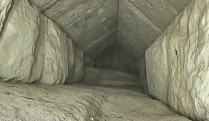 A narrow, empty passage in the Great Pyramid