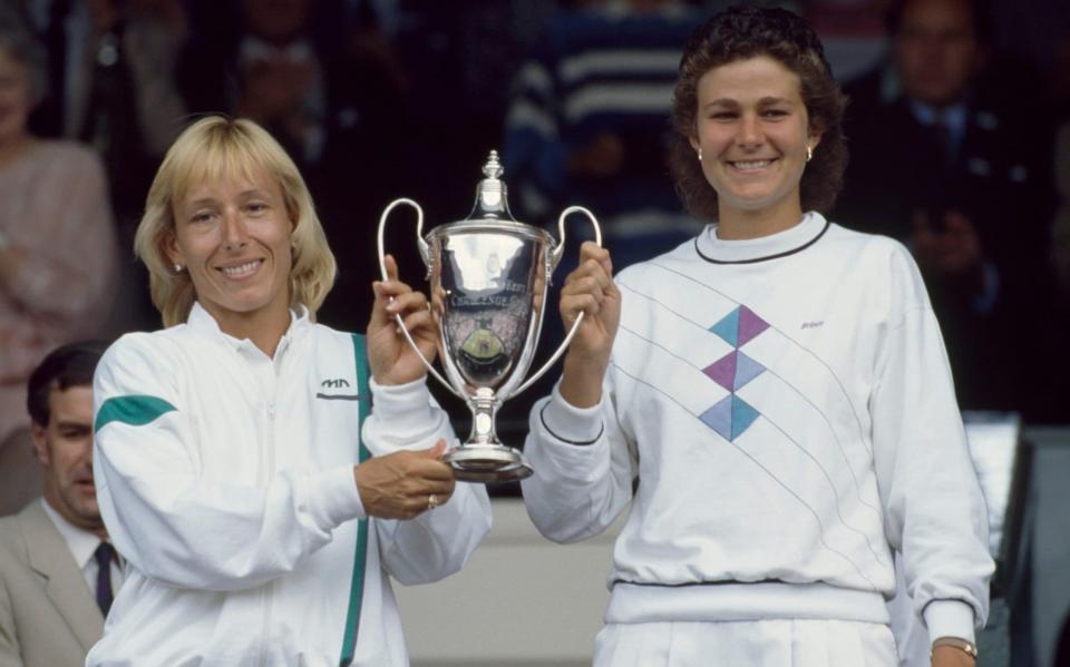 Martina Navratilova (left) and Pam Shriver pose with the trophy - How Pam Shriver's Telegraph revelations led to 'supercoach' role - Getty Images/Professional Sport