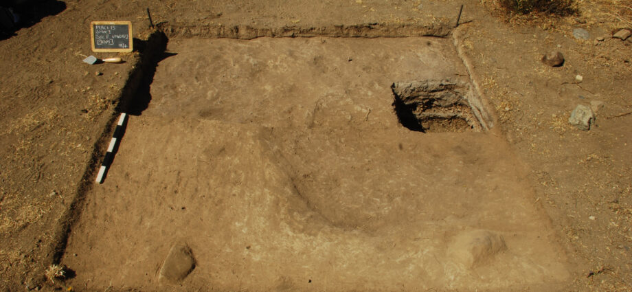 A photo of an excavated section of a platform at a pre-Inca site in Peru.